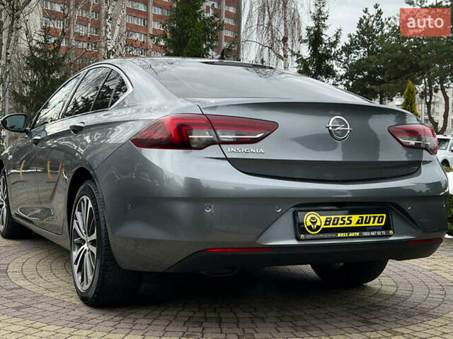 Сірий Опель Інсігнія, об'ємом двигуна 1.96 л та пробігом 113 тис. км за 18700 $, фото 4 на Automoto.ua