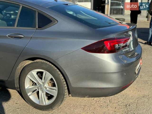 Серый Опель Инсигния, объемом двигателя 1.6 л и пробегом 138 тыс. км за 14990 $, фото 7 на Automoto.ua