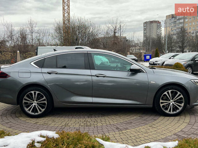 Сірий Опель Інсігнія, об'ємом двигуна 1.96 л та пробігом 113 тис. км за 18700 $, фото 7 на Automoto.ua