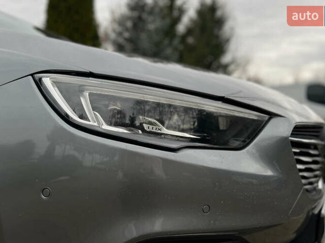 Сірий Опель Інсігнія, об'ємом двигуна 1.96 л та пробігом 113 тис. км за 18700 $, фото 23 на Automoto.ua