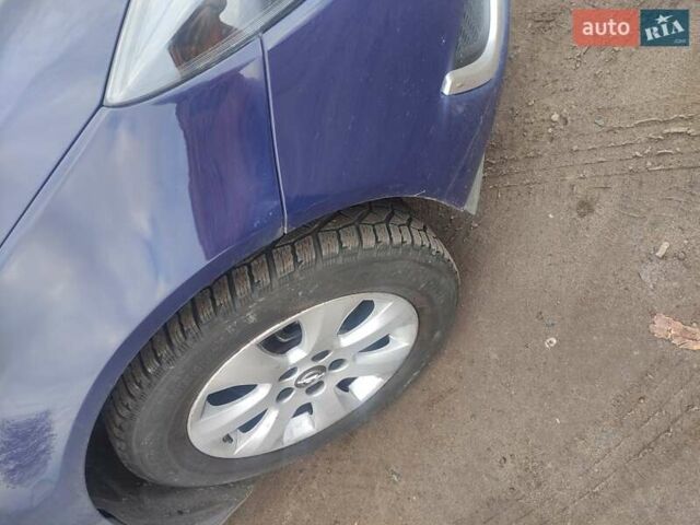 Синий Опель Инсигния, объемом двигателя 1.6 л и пробегом 170 тыс. км за 10999 $, фото 4 на Automoto.ua