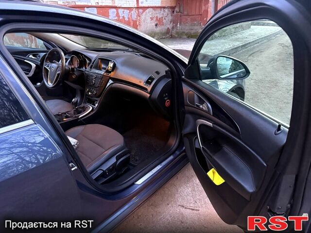 Синий Опель Инсигния, объемом двигателя 2 л и пробегом 350 тыс. км за 4000 $, фото 8 на Automoto.ua