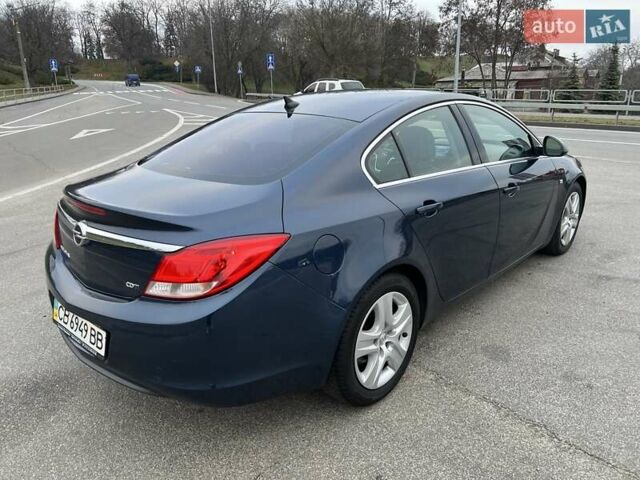 Синий Опель Инсигния, объемом двигателя 1.96 л и пробегом 277 тыс. км за 8250 $, фото 5 на Automoto.ua