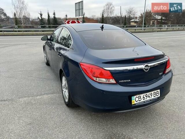 Синий Опель Инсигния, объемом двигателя 1.96 л и пробегом 277 тыс. км за 8250 $, фото 2 на Automoto.ua
