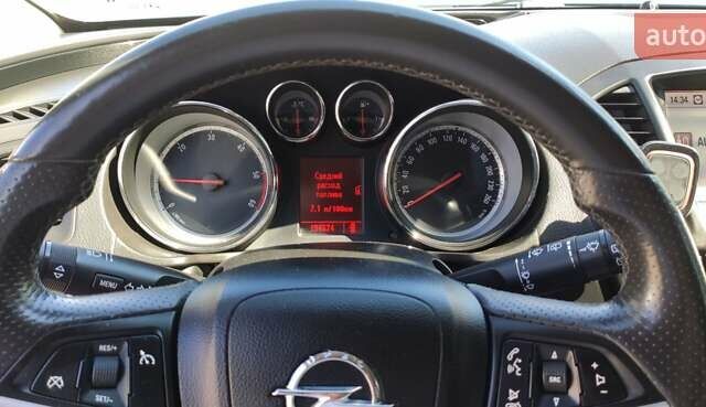 Синий Опель Инсигния, объемом двигателя 1.96 л и пробегом 190 тыс. км за 7500 $, фото 1 на Automoto.ua