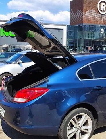 Синий Опель Инсигния, объемом двигателя 1.96 л и пробегом 190 тыс. км за 7500 $, фото 6 на Automoto.ua