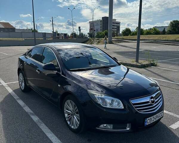Синий Опель Инсигния, объемом двигателя 2 л и пробегом 170 тыс. км за 9300 $, фото 2 на Automoto.ua