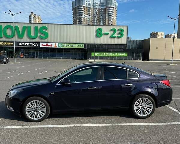 Синий Опель Инсигния, объемом двигателя 2 л и пробегом 170 тыс. км за 9300 $, фото 4 на Automoto.ua