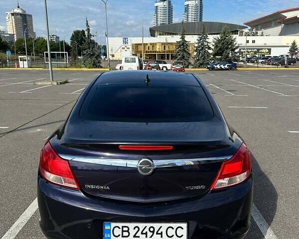 Синий Опель Инсигния, объемом двигателя 2 л и пробегом 170 тыс. км за 9300 $, фото 3 на Automoto.ua