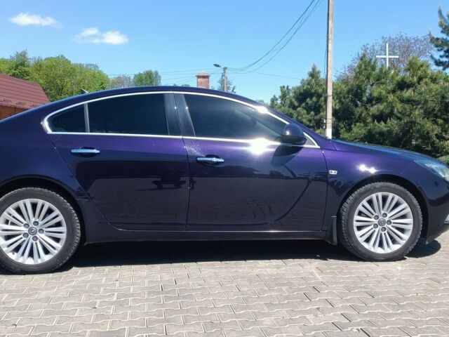 Синий Опель Инсигния, объемом двигателя 2 л и пробегом 183 тыс. км за 9700 $, фото 1 на Automoto.ua