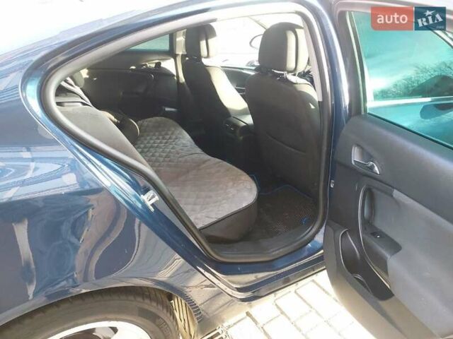 Синій Опель Інсігнія, об'ємом двигуна 1.96 л та пробігом 310 тис. км за 9999 $, фото 6 на Automoto.ua