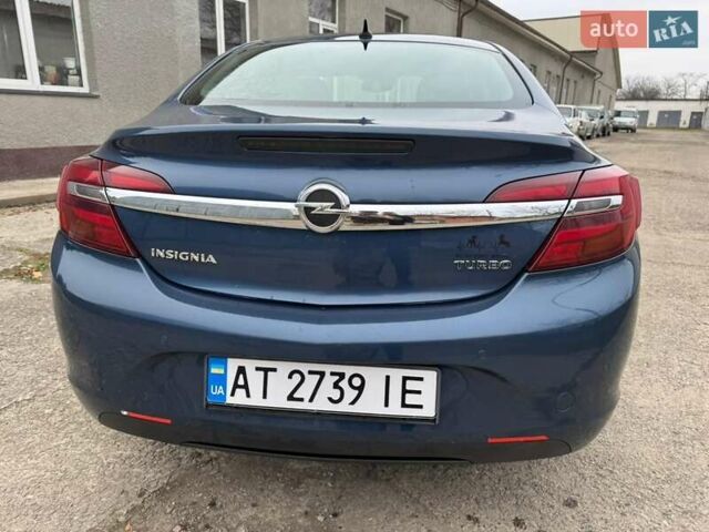 Синий Опель Инсигния, объемом двигателя 1.36 л и пробегом 144 тыс. км за 11250 $, фото 6 на Automoto.ua
