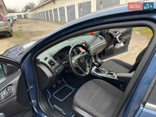 Синий Опель Инсигния, объемом двигателя 1.36 л и пробегом 144 тыс. км за 11250 $, фото 2 на Automoto.ua