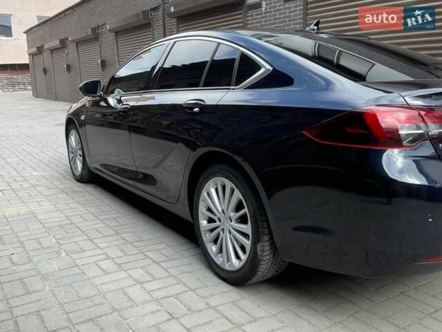 Синий Опель Инсигния, объемом двигателя 1.96 л и пробегом 196 тыс. км за 17000 $, фото 4 на Automoto.ua