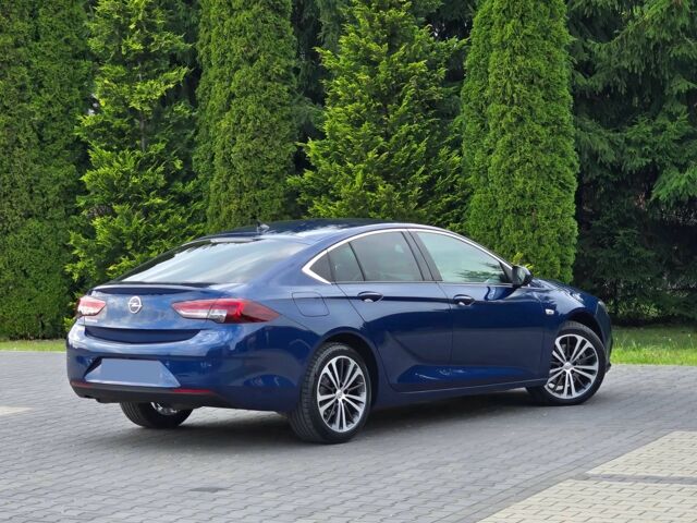 Синій Опель Інсігнія, об'ємом двигуна 2 л та пробігом 40 тис. км за 9500 $, фото 3 на Automoto.ua