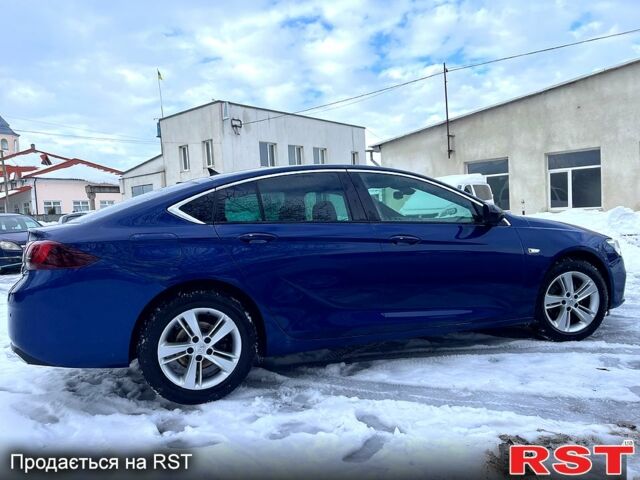 Синий Опель Инсигния, объемом двигателя 2 л и пробегом 11900 тыс. км за 18500 $, фото 4 на Automoto.ua