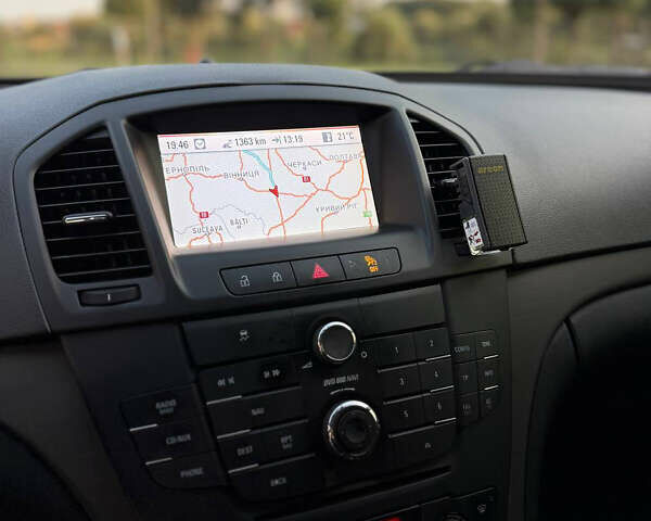 Синий Опель Инсигния, объемом двигателя 1.96 л и пробегом 238 тыс. км за 7000 $, фото 7 на Automoto.ua