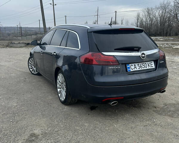 Синій Опель Інсігнія, об'ємом двигуна 1.6 л та пробігом 246 тис. км за 7900 $, фото 2 на Automoto.ua