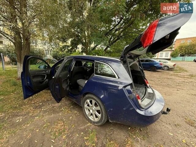 Синій Опель Інсігнія, об'ємом двигуна 2 л та пробігом 241 тис. км за 7100 $, фото 5 на Automoto.ua