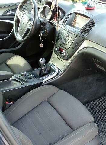 Синий Опель Инсигния, объемом двигателя 1.96 л и пробегом 254 тыс. км за 5700 $, фото 2 на Automoto.ua