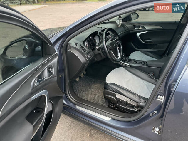 Синий Опель Инсигния, объемом двигателя 1.96 л и пробегом 289 тыс. км за 6594 $, фото 4 на Automoto.ua