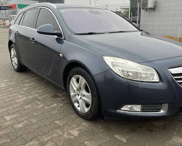 Синий Опель Инсигния, объемом двигателя 1.96 л и пробегом 246 тыс. км за 6650 $, фото 1 на Automoto.ua