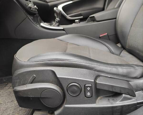 Синій Опель Інсігнія, об'ємом двигуна 1.96 л та пробігом 281 тис. км за 5600 $, фото 26 на Automoto.ua