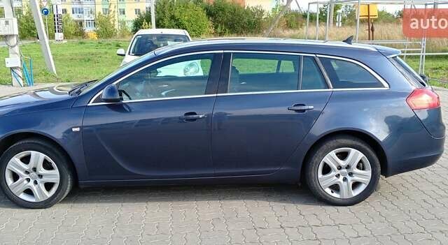 Синий Опель Инсигния, объемом двигателя 2 л и пробегом 252 тыс. км за 6299 $, фото 4 на Automoto.ua