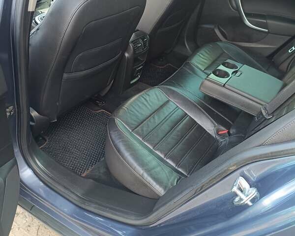 Синий Опель Инсигния, объемом двигателя 1.96 л и пробегом 309 тыс. км за 6999 $, фото 8 на Automoto.ua