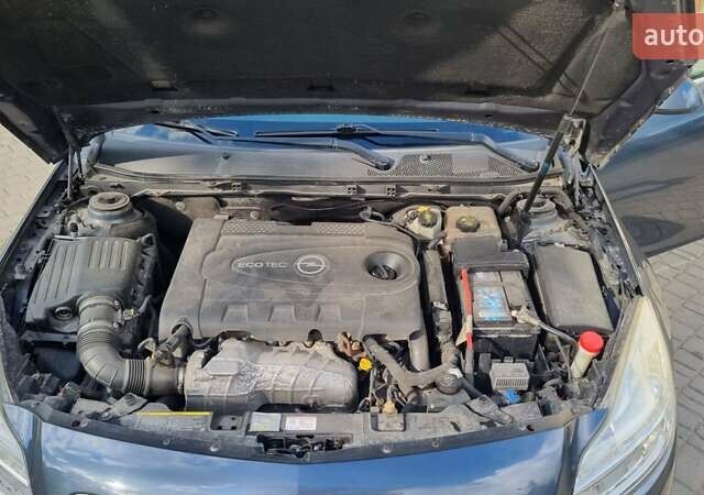 Синий Опель Инсигния, объемом двигателя 1.96 л и пробегом 319 тыс. км за 5600 $, фото 3 на Automoto.ua