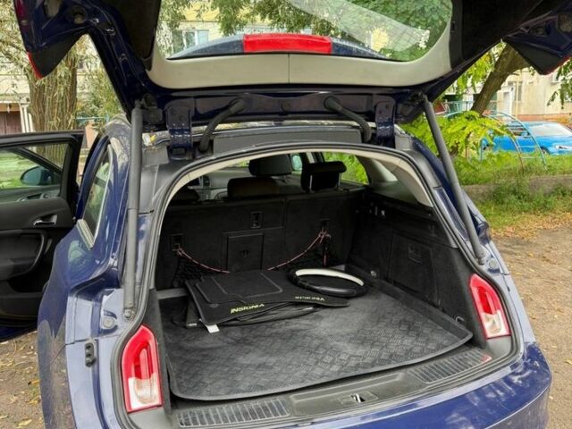 Синій Опель Інсігнія, об'ємом двигуна 2 л та пробігом 241 тис. км за 7100 $, фото 4 на Automoto.ua