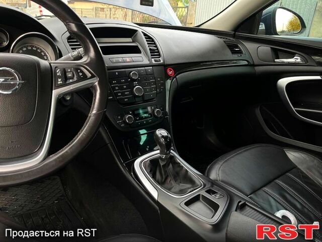 Синий Опель Инсигния, объемом двигателя 1.6 л и пробегом 253 тыс. км за 7100 $, фото 6 на Automoto.ua