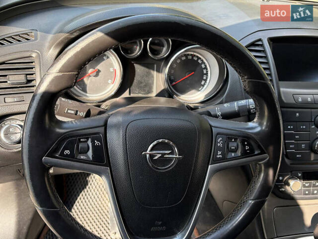 Синий Опель Инсигния, объемом двигателя 1.96 л и пробегом 312 тыс. км за 7500 $, фото 3 на Automoto.ua