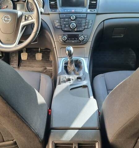 Синий Опель Инсигния, объемом двигателя 1.96 л и пробегом 319 тыс. км за 5600 $, фото 14 на Automoto.ua