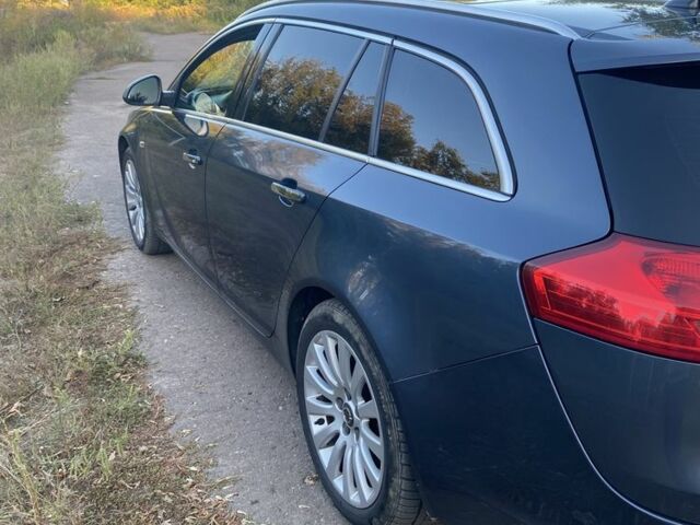 Синий Опель Инсигния, объемом двигателя 2 л и пробегом 320 тыс. км за 8100 $, фото 4 на Automoto.ua