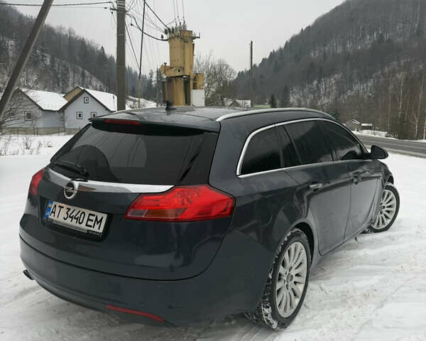 Синий Опель Инсигния, объемом двигателя 2 л и пробегом 256 тыс. км за 7800 $, фото 3 на Automoto.ua