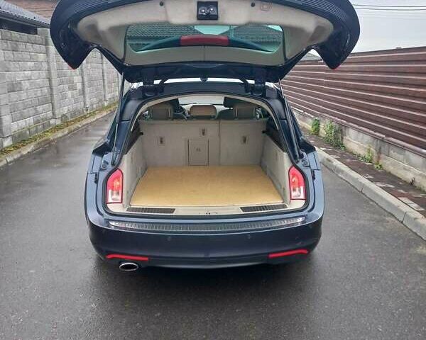 Синий Опель Инсигния, объемом двигателя 1.96 л и пробегом 278 тыс. км за 8200 $, фото 5 на Automoto.ua