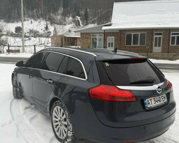 Синий Опель Инсигния, объемом двигателя 2 л и пробегом 256 тыс. км за 7800 $, фото 4 на Automoto.ua
