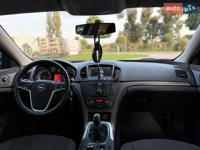 Синий Опель Инсигния, объемом двигателя 1.96 л и пробегом 238 тыс. км за 7000 $, фото 6 на Automoto.ua