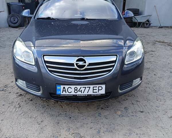Синий Опель Инсигния, объемом двигателя 1.96 л и пробегом 309 тыс. км за 6999 $, фото 1 на Automoto.ua