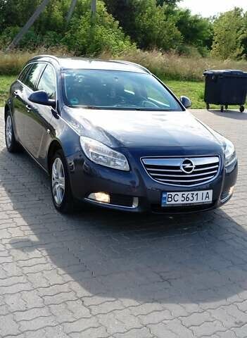 Синий Опель Инсигния, объемом двигателя 1.96 л и пробегом 254 тыс. км за 5700 $, фото 4 на Automoto.ua