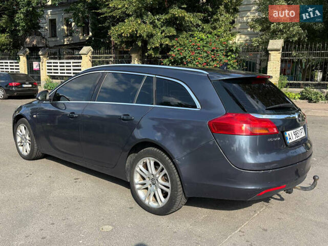 Синий Опель Инсигния, объемом двигателя 1.96 л и пробегом 312 тыс. км за 7500 $, фото 6 на Automoto.ua