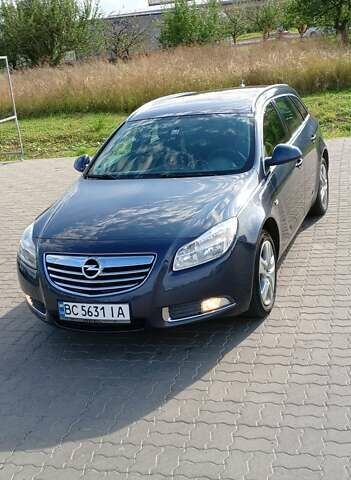 Синий Опель Инсигния, объемом двигателя 2 л и пробегом 252 тыс. км за 6299 $, фото 3 на Automoto.ua