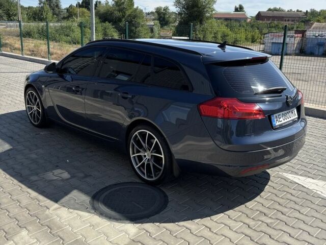 Синій Опель Інсігнія, об'ємом двигуна 1.8 л та пробігом 203 тис. км за 8400 $, фото 3 на Automoto.ua