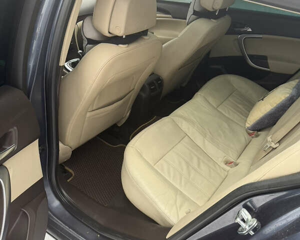 Синий Опель Инсигния, объемом двигателя 2 л и пробегом 256 тыс. км за 7800 $, фото 5 на Automoto.ua