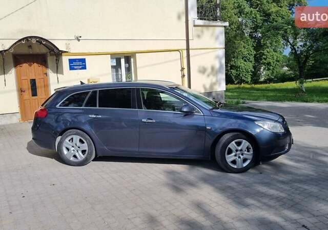 Синий Опель Инсигния, объемом двигателя 1.96 л и пробегом 319 тыс. км за 5600 $, фото 19 на Automoto.ua