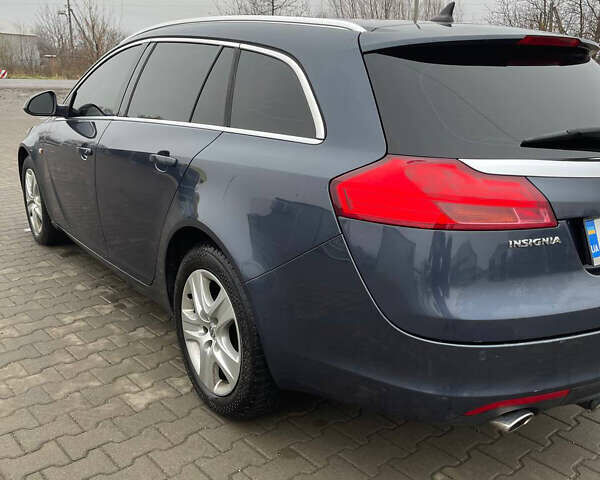 Синий Опель Инсигния, объемом двигателя 1.96 л и пробегом 246 тыс. км за 6650 $, фото 8 на Automoto.ua