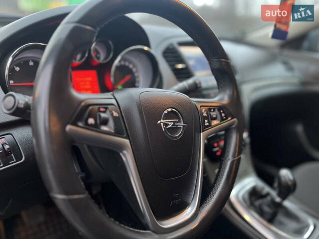 Синій Опель Інсігнія, об'ємом двигуна 1.96 л та пробігом 255 тис. км за 8200 $, фото 26 на Automoto.ua