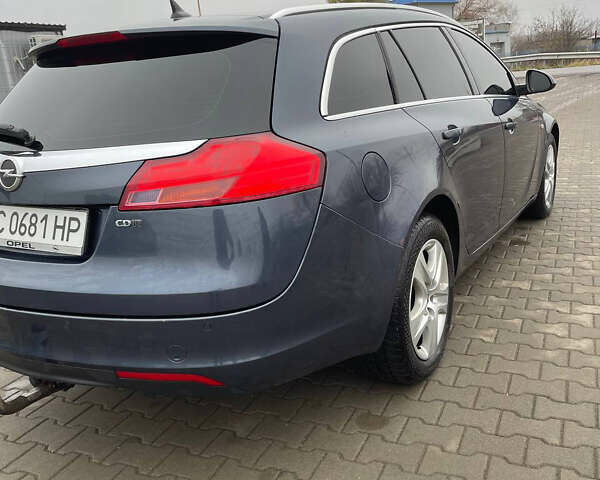 Синий Опель Инсигния, объемом двигателя 1.96 л и пробегом 246 тыс. км за 6650 $, фото 4 на Automoto.ua