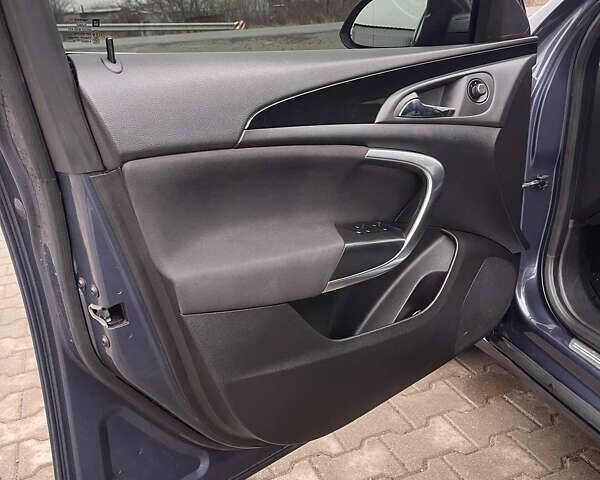 Синий Опель Инсигния, объемом двигателя 1.96 л и пробегом 246 тыс. км за 6650 $, фото 9 на Automoto.ua